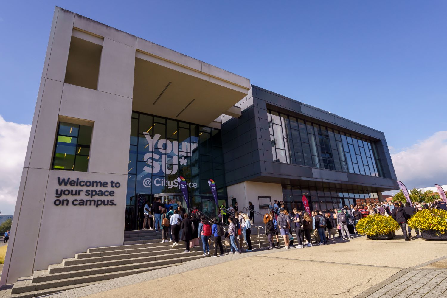 Student's queuing outside the main entrance to CitySpace