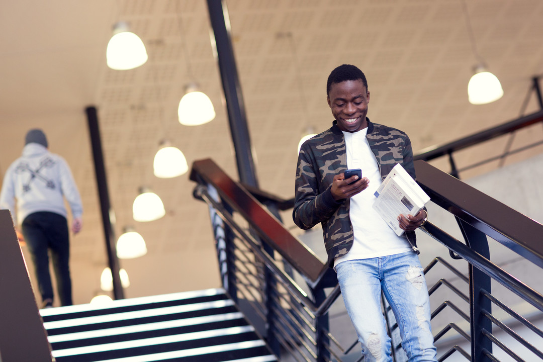 Student walking down the stairs