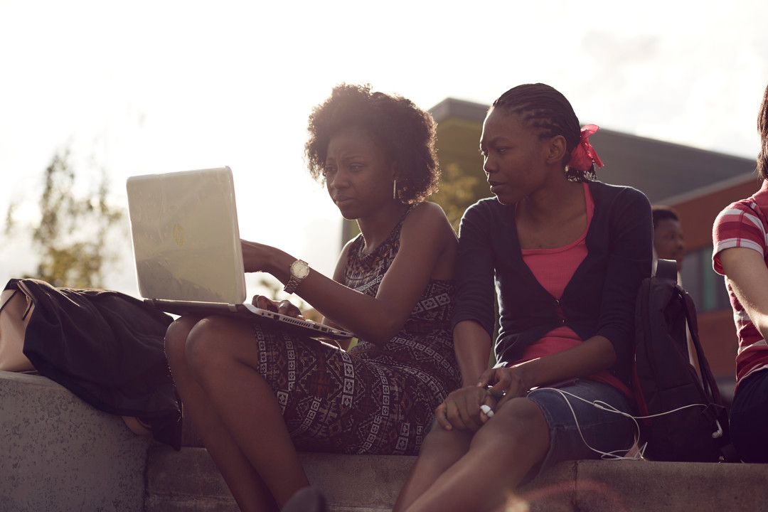 Student on a laptop at city campus