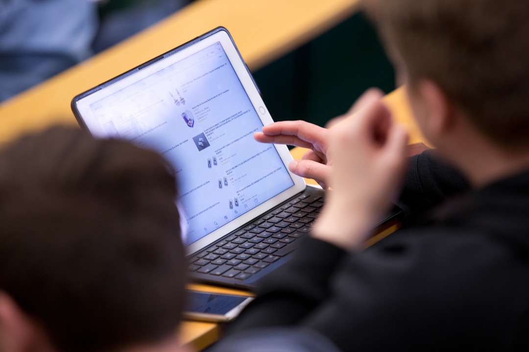 Student on an iPad in lectures